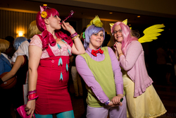 Size: 2000x1333 | Tagged: safe, artist:metricjack, artist:patcave, fluttershy, pinkie pie, spike, human, g4, 2013, bowtie, clothes, convention, cosplay, glasses, irl, irl human, momocon, party horn, photo, suspenders, sweat, sweatershy