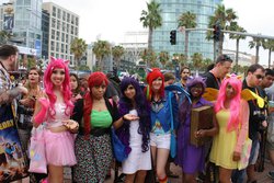 Size: 960x640 | Tagged: artist needed, safe, artist:martin-ortega, fluttershy, pinkie pie, rainbow dash, rarity, twilight sparkle, human, g4, 2012, book, clothes, convention, cosplay, elements of harmony, feather boa, irl, irl human, photo, san diego comic con, sweater, sweatershy, tutu