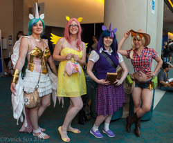 Size: 2000x1656 | Tagged: safe, artist:patcave, applejack, fluttershy, princess celestia, twilight sparkle, human, g4, 2012, armor, book, clothes, convention, convention:fanime14, cosplay, fanime14, front knot midriff, glasses, irl, irl human, midriff, photo, san diego comic con, sandals, sdcc 2012, skirt, sweater vest