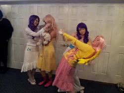 Size: 960x720 | Tagged: safe, artist:tibsistops, fluttershy, rarity, human, g4, 2012, anime conji, convention, cosplay, dancing, glasses, irl, irl human, multeity, photo