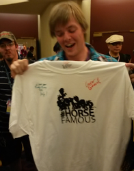 Size: 305x390 | Tagged: safe, human, #horsefamous, clothes, convention, horse famous, irl, mic the microphone, photo, shirt, signature, signed, t-shirt