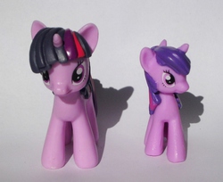Size: 940x768 | Tagged: safe, twilight sparkle, pony, unicorn, g4, blind bag, comparison, female, figure, irl, photo, size comparison, toy