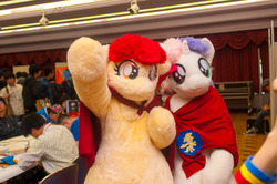 Size: 1280x850 | Tagged: safe, apple bloom, sweetie belle, human, g4, cosplay, fursuit, irl, irl human, photo