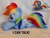 Size: 1027x777 | Tagged: dead source, safe, artist:epicrainbowcrafts, rainbow dash, pegasus, pony, g4, clothes, cute, deviantart watermark, folded wings, hoodie, irl, lying down, obtrusive watermark, photo, plushie, prone, solo, watermark, wings