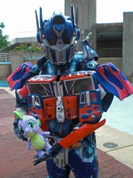 Size: 720x960 | Tagged: safe, spike, g4, cosplay, irl, optimus prime, photo, plushie, spike plushie, transformers