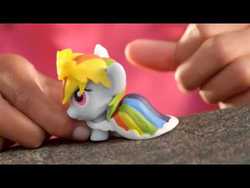 Size: 480x360 | Tagged: safe, rainbow dash, human, g4, at the gala, clothes, commercial, crown, cute, dress, fash'ems, hand, irl, irl human, letterboxing, photo, target demographic, toy