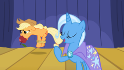 Size: 1365x768 | Tagged: safe, screencap, applejack, trixie, boast busters, g4, apple, apple gag, bondage, bound and gagged, eyes closed, floppy ears, gag, hogtied, open mouth, rope, smiling, tied up, unamused