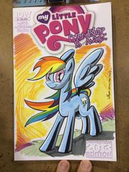 Size: 600x800 | Tagged: safe, artist:thom zahler, idw, rainbow dash, pegasus, pony, g4, spoiler:comic08, 2014, comic cover, female, heroescon, heroescon 2014, irl, mare, photo, signature, smiling, solo, spread wings, tail, traditional art, wings