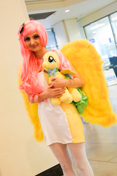 Size: 684x1024 | Tagged: safe, fluttershy, human, g4, build-a-bear, cosplay, irl, irl human, photo, plushie, solo
