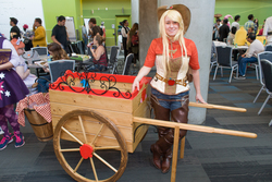 Size: 1080x720 | Tagged: artist needed, safe, applejack, human, g4, 2014, cart, chaps, convention, cosplay, defictionalization, element of honesty, fanimecon, irl, irl human, photo