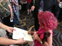 Size: 600x450 | Tagged: safe, pinkie pie, human, trotcon, g4, 2013, autograph, convention, cosplay, irl, irl human, photo, target demographic