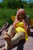 Size: 1024x1540 | Tagged: safe, artist:tikkanii, fluttershy, human, g4, barefoot, cosplay, feet, foot focus, irl, irl human, photo, soles, solo, tattoo