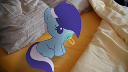 Size: 3840x2160 | Tagged: safe, artist:bastbrushie, oc, oc only, oc:brushie brusha, earth pony, pony, baby, baby pony, bed, female, filly, foal, high res, holiday, irl, pacifier, photo, ponies in real life, sitting, solo