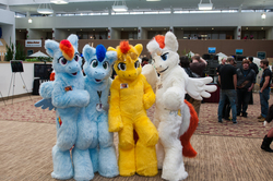 Size: 4288x2848 | Tagged: safe, artist:bellacoyote, fire streak, rainbow dash, soarin', spitfire, human, g4, anime detour, convention, cosplay, fursuit, group, irl, irl human, photo, ponysuit, quartet