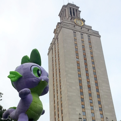 Size: 1000x1000 | Tagged: safe, artist:texasuberalles, spike, dragon, g4, forced perspective, irl, male, photo, plushie, ponies around the world, solo, spike plushie, ut tower