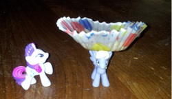 Size: 480x277 | Tagged: safe, artist:amythestquill, derpy hooves, rarity, pegasus, pony, g4, derpy makes muffins, female, hat, i just don't know what went wrong, irl, mare, muffin, photo, silly derpy that's not a hat, toy