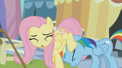 Size: 1280x720 | Tagged: safe, screencap, fluttershy, rainbow dash, pegasus, pony, g4, the crystal empire, female, mare, out of context, pushing, rump push