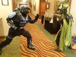 Size: 1024x768 | Tagged: safe, artist:everfreenw, changeling, human, 2014, armor, convention, cosplay, everfree northwest, everfree northwest 2014, green changeling, halo (series), irl, irl human, photo, shield, spartan