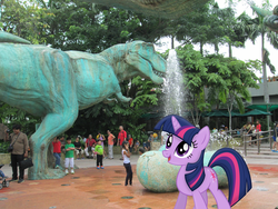 Size: 4608x3456 | Tagged: safe, artist:missbeigepony, artist:vaderpl, twilight sparkle, dinosaur, human, tyrannosaurus rex, g4, egg, irl, jurassic park, park, photo, ponies in real life, singapore, solo, statue, tree, universal studios, vector, water fountain