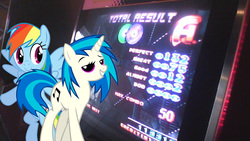 Size: 2222x1250 | Tagged: safe, dj pon-3, rainbow dash, vinyl scratch, g4, arcade, dance dance revolution, irl, photo, ponies in real life, rhythm game