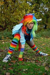 Size: 461x696 | Tagged: safe, artist:millithechan, rainbow dash, human, g4, clothes, cosplay, grass, irl, irl human, photo, rainbow socks, socks, solo, spread legs, striped socks, superhero landing