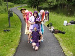 Size: 696x522 | Tagged: safe, artist:azalais, artist:elora, applejack, fluttershy, pinkie pie, rainbow dash, rarity, spike, twilight sparkle, human, g4, 2012, clothes, cosplay, irl, irl human, mane six, nipponcon, photo, rainbow socks, socks, striped socks