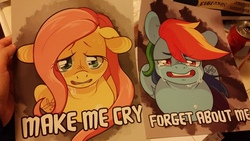 Size: 1280x720 | Tagged: safe, artist:clovercoin, fluttershy, rainbow dash, g4, caption, crying, irl, looking at you, prints, sad