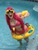 Size: 960x1280 | Tagged: safe, artist:radicalkevin123, artist:subzerocosplay, pinkie pie, human, g4, belly button, bikini, clothes, cosplay, goggles, inner tube, irl, irl human, photo, solo, swim mask, swimming pool, swimsuit, thumbs up, water