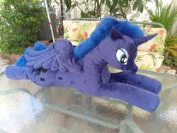 Size: 2560x1920 | Tagged: safe, artist:neysanight, princess luna, alicorn, pony, g4, irl, lying down, outdoors, photo, plushie, prone, solo, spread wings, wings