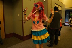 Size: 500x332 | Tagged: safe, artist:yunsildin, human, 2011, clothes, convention, cosplay, irl, irl human, izumicon, party horn, photo, skirt, solo, sunglasses