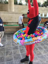 Size: 768x1024 | Tagged: safe, human, bronycon, 2014, ball pit, barely pony related, clothes, convention, cosplay, costume, dashcon, deadpool, irl, irl human, parody, photo, solo, stage