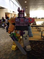 Size: 540x720 | Tagged: safe, artist:whiteboygus, human, bronycon, 2014, combiner, convention, cosplay, irl, irl human, megazord, photo, sword, transformers, weapon