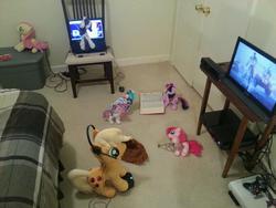 Size: 816x612 | Tagged: artist needed, safe, applejack, fluttershy, rarity, twilight sparkle, g4, book, computer, headset, irl, laptop computer, photo, playing, plushie, television