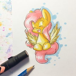 Size: 605x604 | Tagged: safe, artist:y0wai, fluttershy, g4, cute, eyes closed, female, open mouth, pencil, prone, smiling, solo, spread wings, traditional art