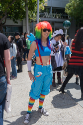 Size: 2336x3504 | Tagged: safe, rainbow dash, human, g4, belly button, clothes, cosplay, high res, irl, irl human, midriff, photo, rainbow socks, socks, striped socks, suspenders