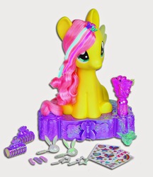 Size: 1293x1500 | Tagged: safe, fluttershy, g4, official, barrette, brushable, female, sitting, solo, sticker, styling size, toy