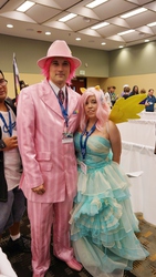 Size: 3376x6000 | Tagged: artist needed, safe, fluttershy, pinkie pie, human, bronycon, g4, green isn't your color, bubble berry, clothes, cosplay, dress, irl, irl human, photo, pinkie guy, rule 63, suit