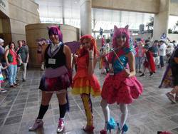 Size: 960x720 | Tagged: safe, artist:lochlan o'neil, artist:sarahndipity cosplay, pinkie pie, sunset shimmer, twilight sparkle, human, bronycon, bronycon 2014, equestria girls, g4, my little pony equestria girls: rainbow rocks, clothes, convention, cosplay, drumsticks, high heels, irl, irl human, pantyhose, photo, shoes, skirt, socks