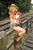 Size: 800x1200 | Tagged: safe, artist:astrid riddle, applejack, human, g4, belly button, clothes, cosplay, daisy dukes, front knot midriff, irl, irl human, midriff, photo