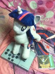 Size: 720x960 | Tagged: artist needed, safe, twilight sparkle, g4, arcade stick, bed, blanket, horn, horn ring, irl, jin, photo, pillow, playstation, plushie, tomb raider