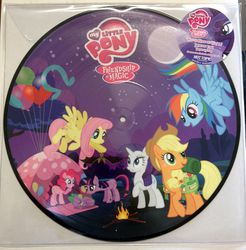 Size: 946x960 | Tagged: safe, applejack, fluttershy, pinkie pie, princess luna, rainbow dash, rarity, spike, twilight sparkle, earth pony, pegasus, pony, unicorn, g4, balloon, campfire, female, flying, hot topic, irl, logo, mane six, mare, merchandise, my little pony logo, photo, raised hoof, record, tent, unicorn twilight, vinyl