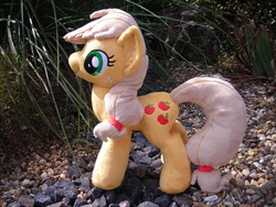 Size: 2592x1944 | Tagged: safe, artist:justiceofelements, applejack, earth pony, pony, g4, hatless, irl, missing accessory, outdoors, photo, plushie, solo