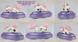 Size: 1024x558 | Tagged: safe, artist:aachi-chan, sweetie belle, g4, bored, figurine, one of a kind, scootie belle, scooting, sculpture