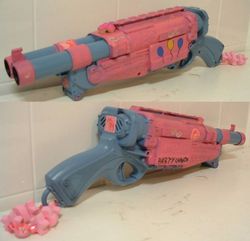 Size: 600x578 | Tagged: safe, pinkie pie, g4, customized toy, irl, my little arsenal, nerf, nerf gun, photo