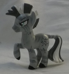 Size: 1725x1845 | Tagged: safe, artist:gryphyn-bloodheart, oc, oc only, oc:xenith, zebra, fallout equestria, blind bag, customized toy, fanfic, female, irl, mare, photo, raised hoof, solo, toy, zebra oc