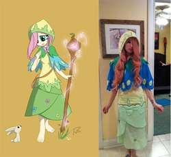 Size: 523x480 | Tagged: safe, artist:didj, artist:prosforcons, artist:rougeleaderred, angel bunny, fluttershy, human, rabbit, my little mages, g4, barefoot, capelet, clothes, cosplay, defictionalization, dress, fantasy class, feet, hair over one eye, hood, humanized, irl, irl human, looking down, photo, smiling, solo, staff
