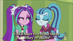 Size: 642x360 | Tagged: safe, screencap, adagio dazzle, aria blaze, sonata dusk, equestria girls, g4, my little pony equestria girls: rainbow rocks, animated, clothes, female, gem, jewelry, necklace, reaction image, siren gem, subtitles, surrounded by idiots, the dazzlings