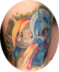 Size: 857x1043 | Tagged: safe, derpy hooves, trixie, human, g4, hug, irl, irl human, photo, smiling, tattoo, wink