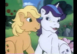 Size: 455x320 | Tagged: safe, screencap, applejack (g1), glory, earth pony, pony, unicorn, g1, rescue at midnight castle, animated, bow, cute, face licking, female, glorybetes, horses doing horse things, jackabetes, licking, mare, silly, silly pony, tail bow, who's a silly pony