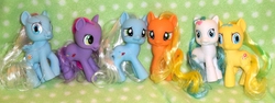 Size: 1071x402 | Tagged: safe, pony, g3, g3.5, bootleg, concerned pony, irl, photo, toy